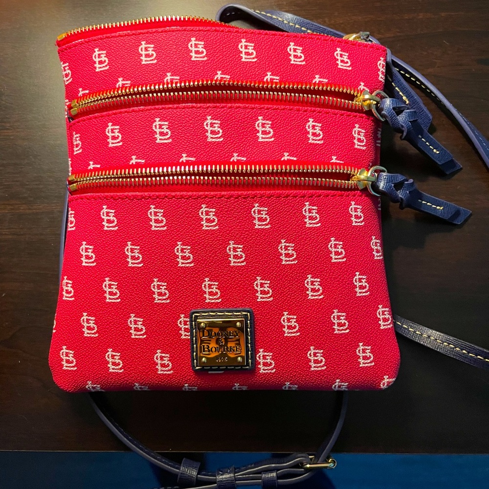 Dooney and Bourke crossbody St. Louis cardinals bag. Brand new. Never been used.
